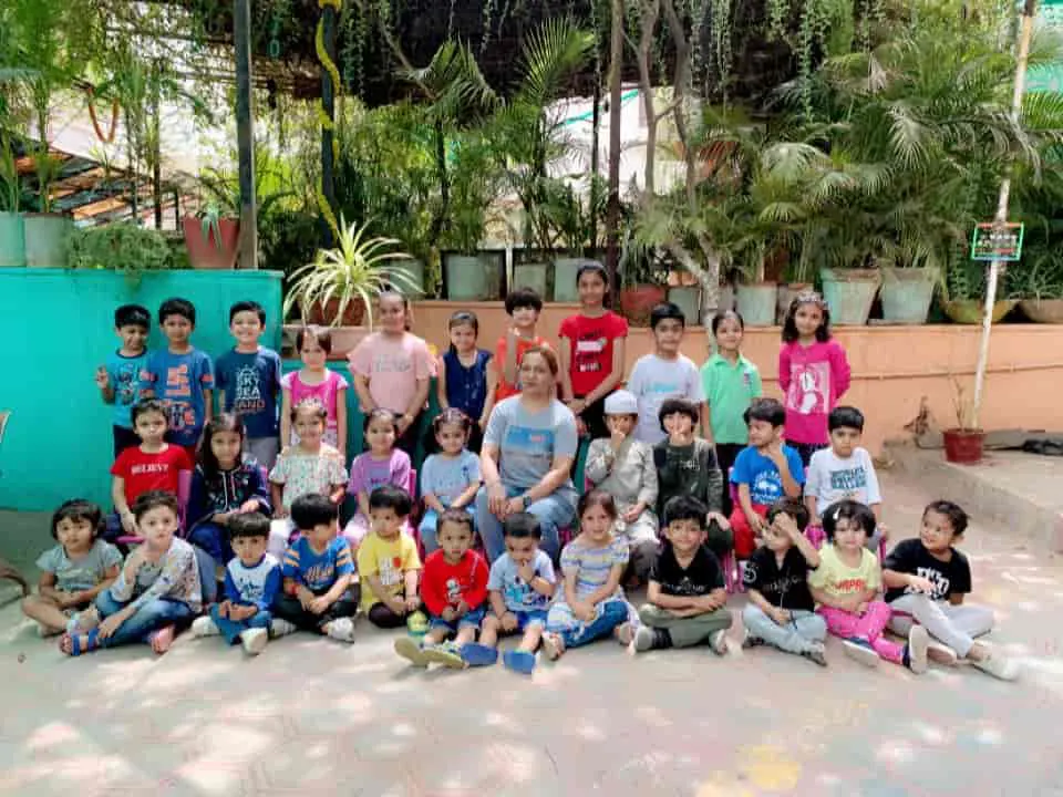 Playway children and teachers group photo in the garden
