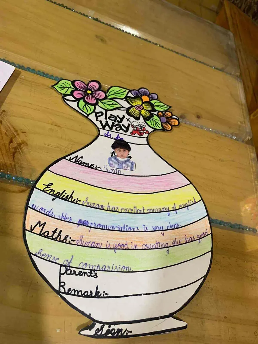 Colourful vase-shaped progress card made by a child